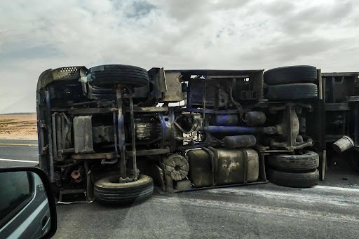 Poor truck maintenance on display after semi truck crashes.